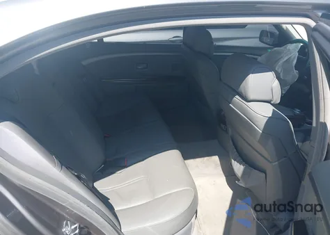 2006 BMW 750Li z USA, uszkodzony, nr VIN WBAHN83516DT59611